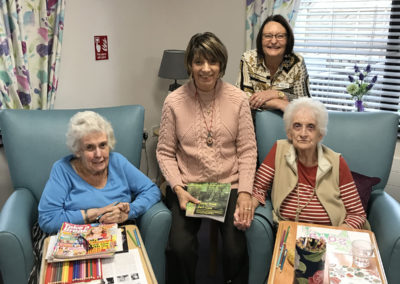 Author Sylvia Bryden-Stock with the Home Manager and residents at St Winifreds Care Home