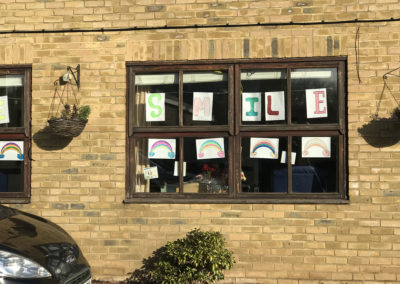 Rainbow and smile posters in the windows at St Winifreds Residential Care Home 2