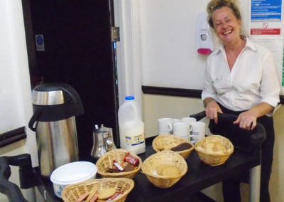 Staff member with a tea trolley at St Winifreds Residential Care Home