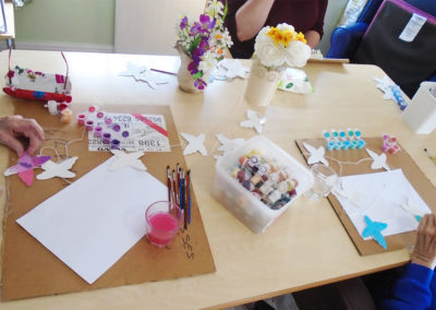 A table of paints and bunting at St Winifreds Care Home