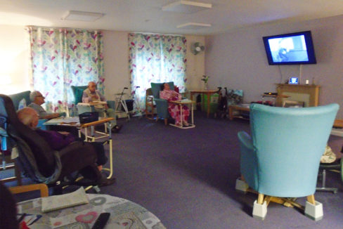 St Winifreds Residential Care Home residents enjoy a Carry On film in their lounge