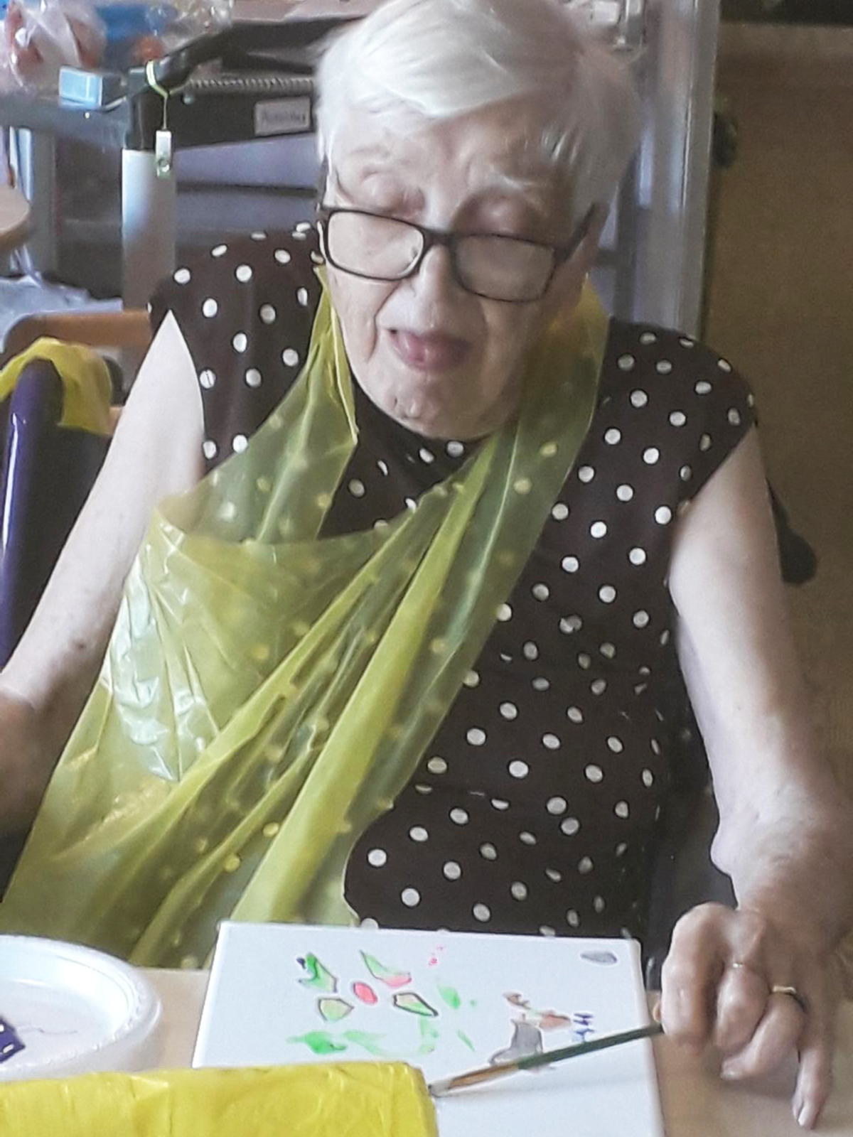 St Winifreds Care Home resident painting on a canvas