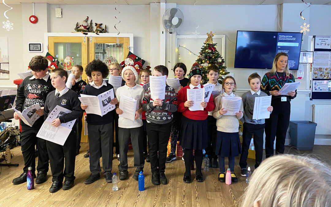 Warden House school choir performs at St Winifreds Care Home