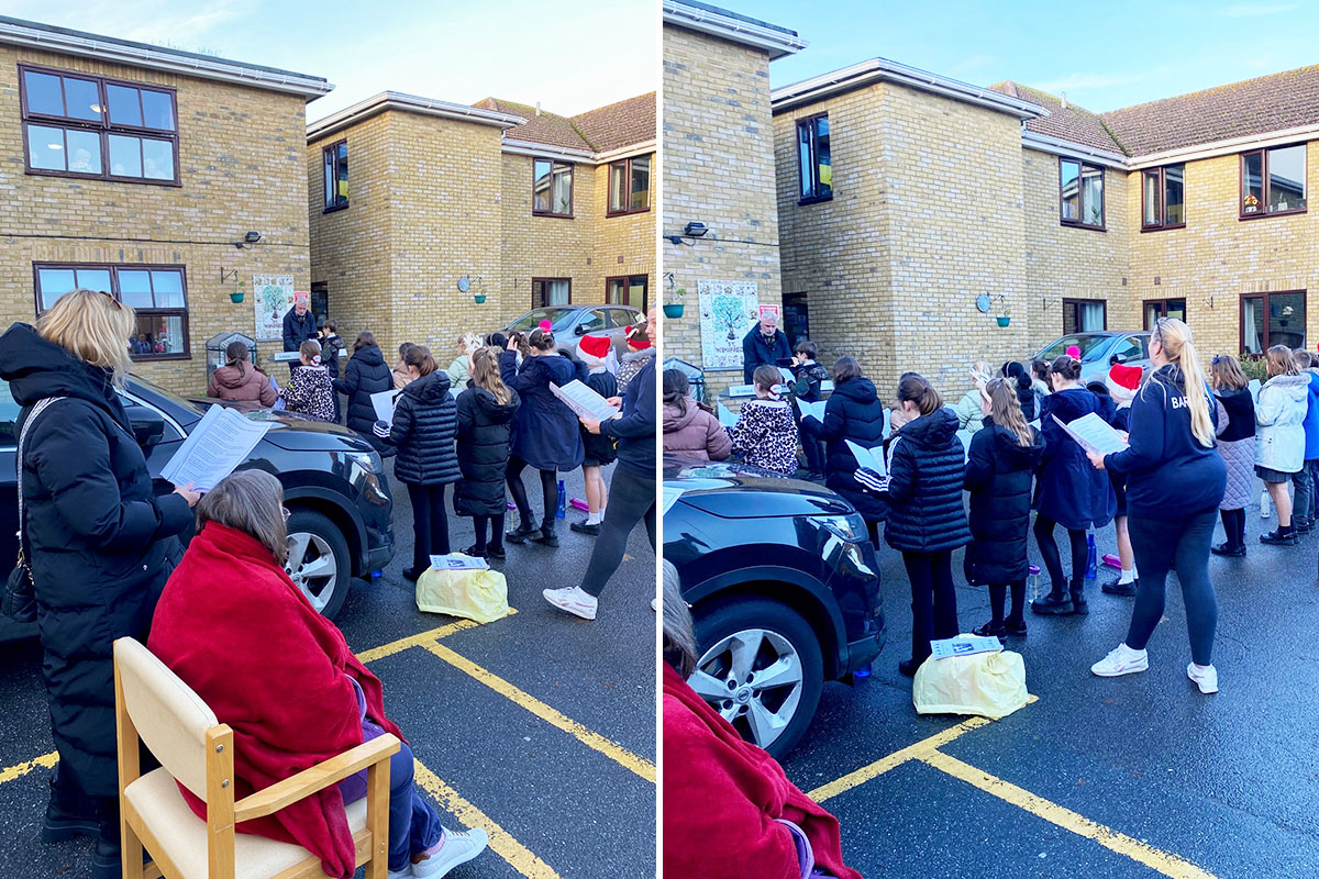 Local school choir singing outside St Winifreds Care Home